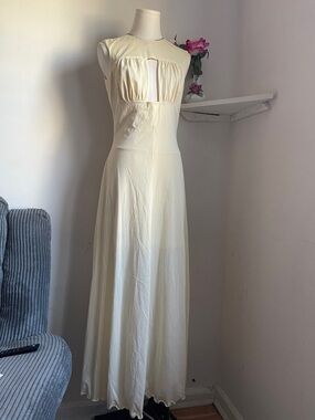 Elegant Cream Maxi Dress with Cutout Detail